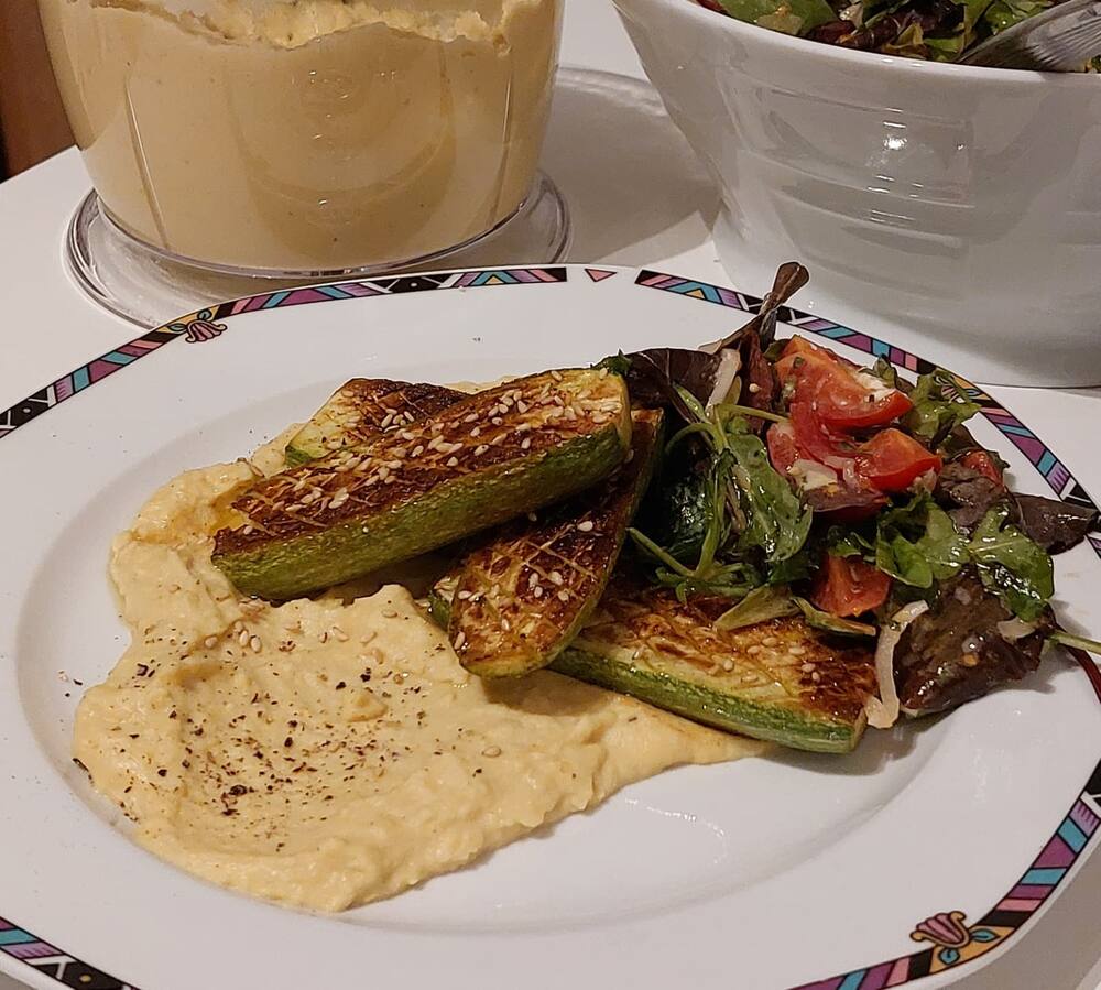 Grilled courgette and aubergine with hummus and a small side salad